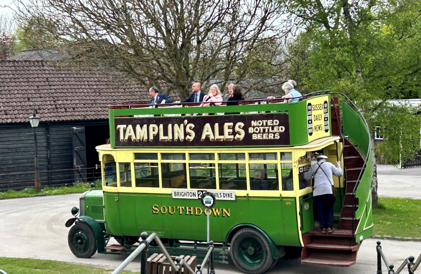Andrew Griffith on open top bus with Lady Emma Barnard